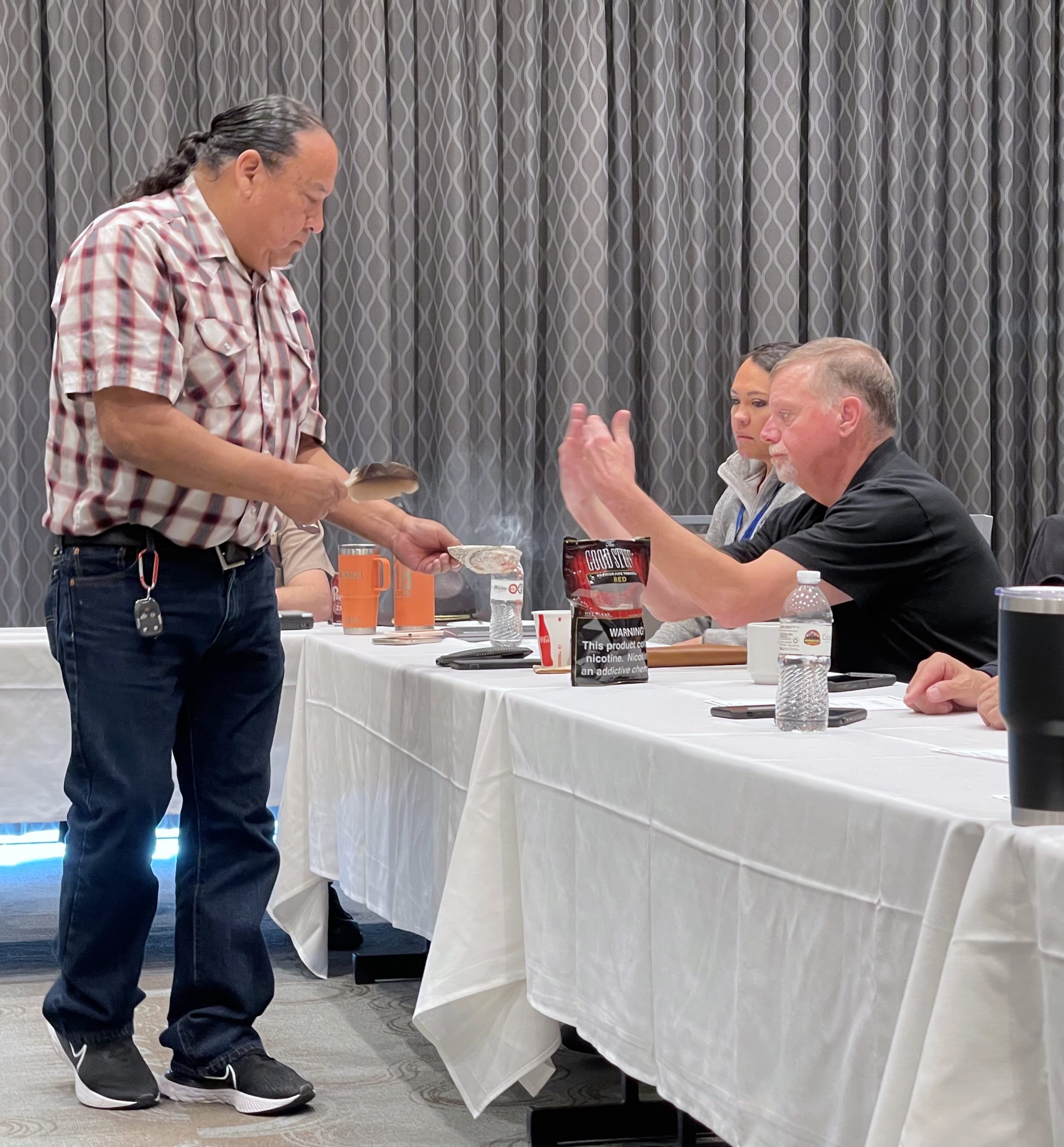 Leech Lake Band of Ojibwe Holistic Health Spiritual Care Coordinator Gary Charwood blessed the event with an eagle feather used to waft a cleansing smoke over each person. “We are relatives,” he said. “We all do the work to take care of one another.”