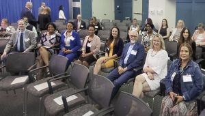 AATTAP team members and family survivors await of the start of the 2024 National Missing Children’s Day event at the U.S. Department of Justice Great Hall on May 22 in Washington D.C.