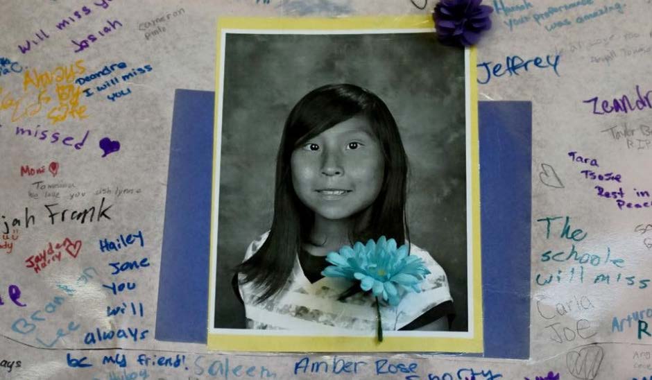 Photo of Ashlynne Mike on a poster of loving messages to the girl, who was abducted and then murdered on the Navajo Nation in 2016.