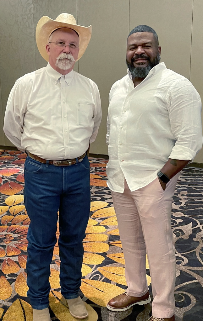 Photograph of Texas Department of Public Safety Regional AMBER Alert Coordinators John Graham, left, and Michael Nixon, right