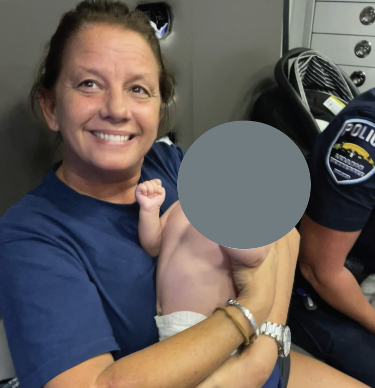 Shelly Smitherman, early in her career, with an unidentified/unidentifiable rescued baby.