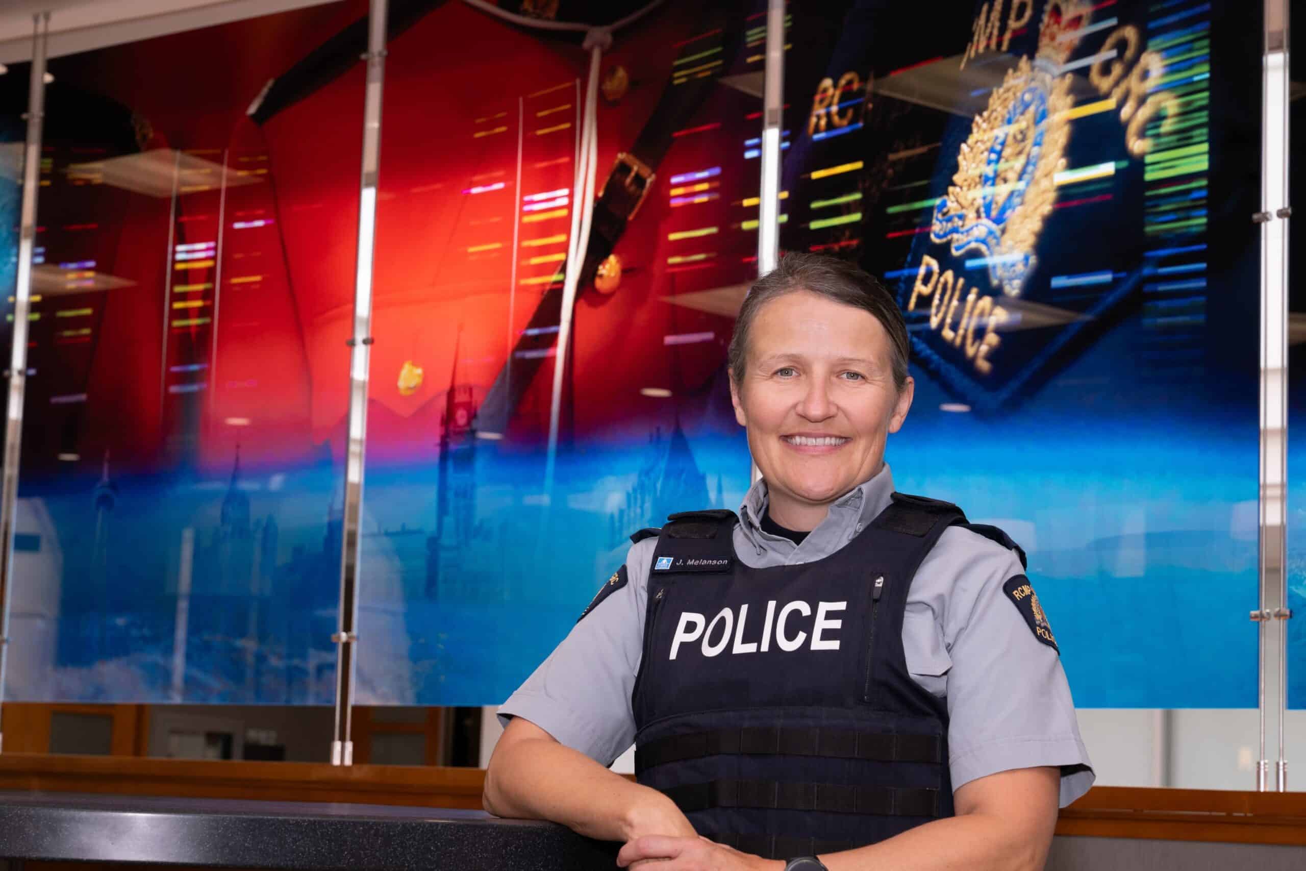 Woman wearing police vest