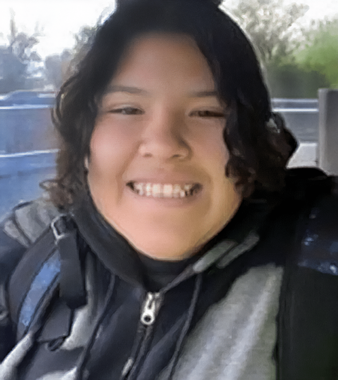 Photo of young woman smiling (Sa'Wade Birdinground)