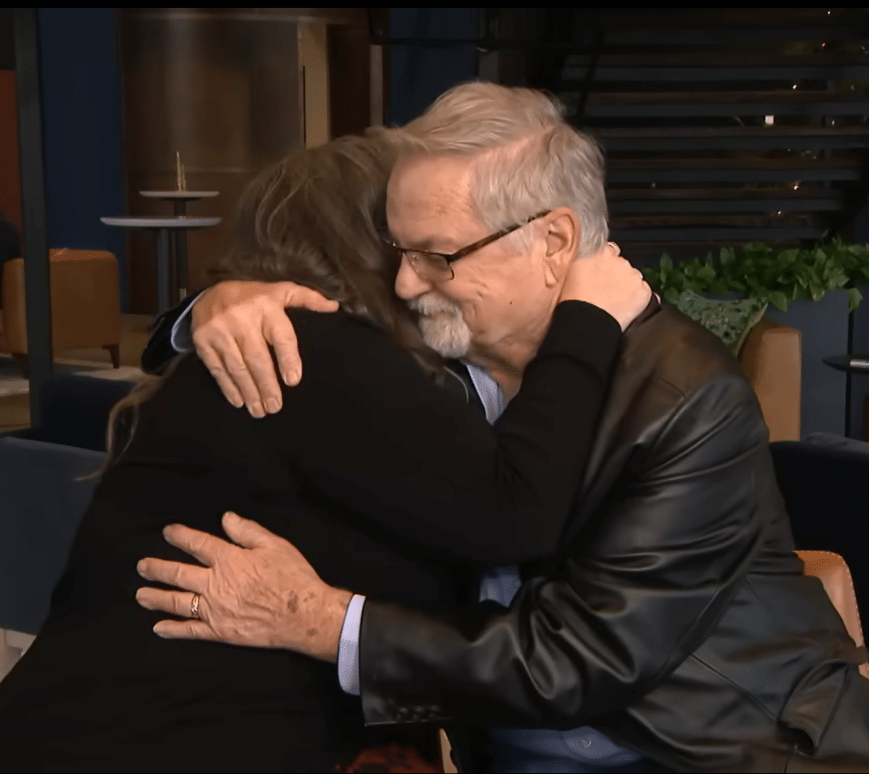 Photo of a man and woman hugging