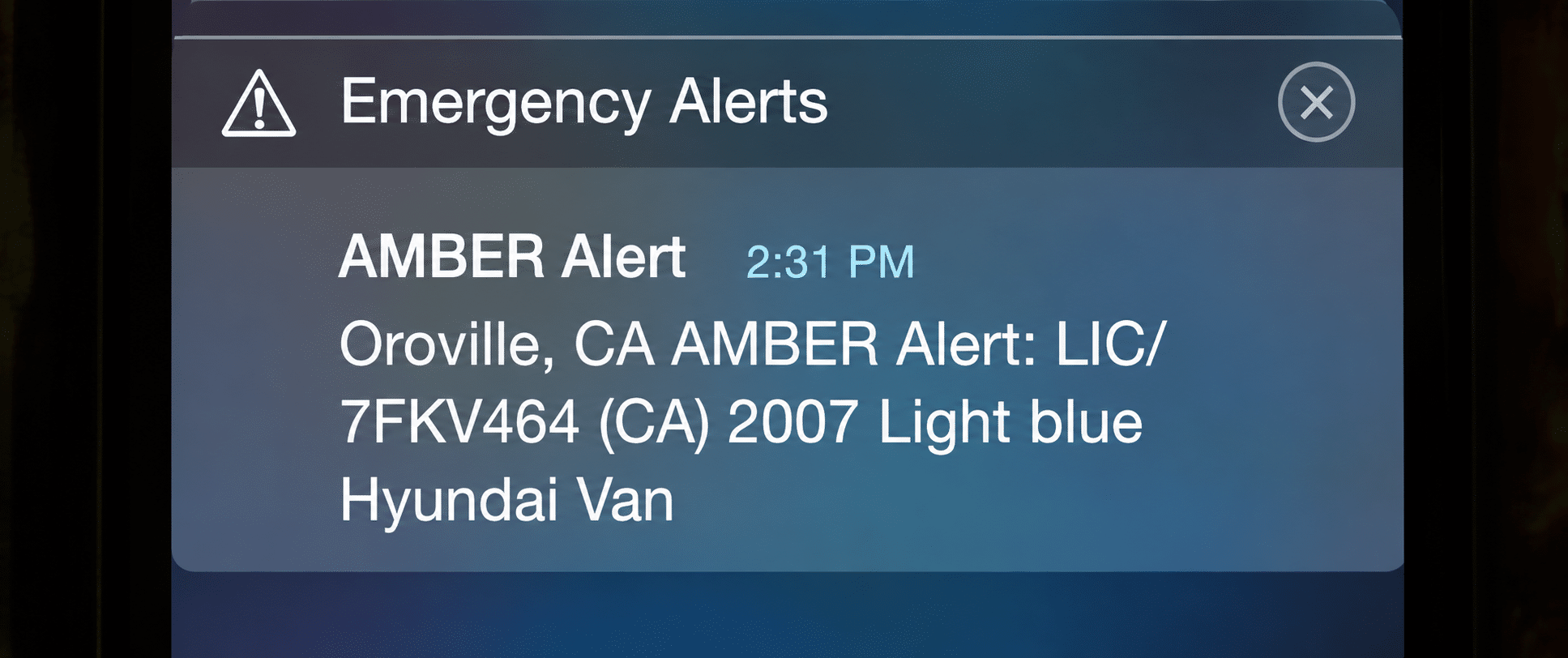 Photo of a California AMBER Alert on a cell phone screen