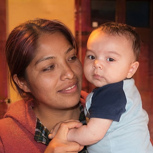 Victim Eva Arce Perez with her son