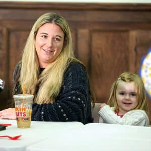 Abducted child Hailey Traynham, right, with her mother at a press conference.