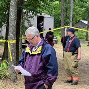 Photo of Maine's AMBER Alert Coordinator, Lieutenant Brian McDonough, shown working an investigation.