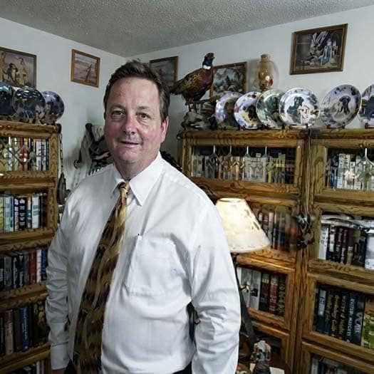 Photo of Mark Simpson in his home office