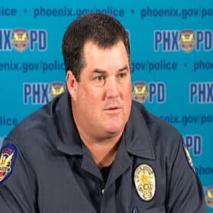Phoenix police officer speaking at a press conference