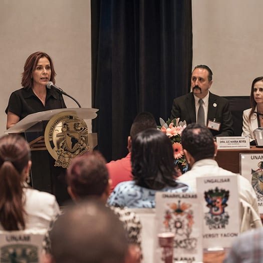 Alerta AMBER meeting in Mexico City-tight shot of person talking while others look on