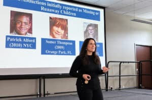Victoria Martuscello presenting on child abductions at a library.